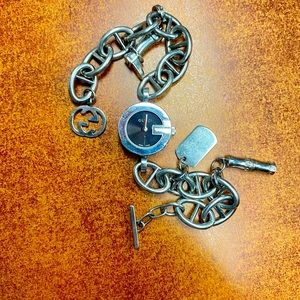 Gucci woman’s charm bracelet watch